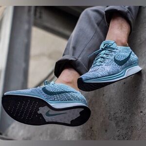 Nike Shoes Flyknit Racer Sneakers Women’s size 8.5 men’s size 7